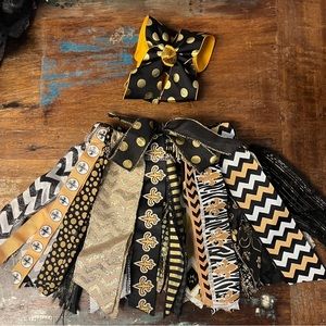 Handmade Saints skirt made with ribbons and matching bow.